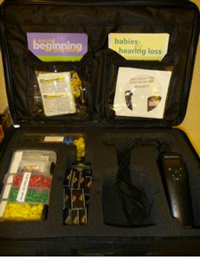 OAE Screener inside traveling case