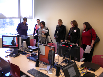 a group of TI professionals testing various types of TI technology