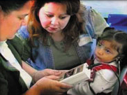 a girl getting a hearing screening